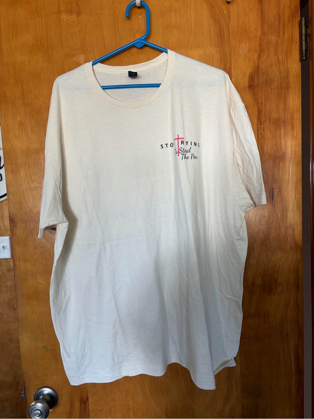 Neutral Cream Graphic Tee with Subtle Pink Accent with designs on front and back